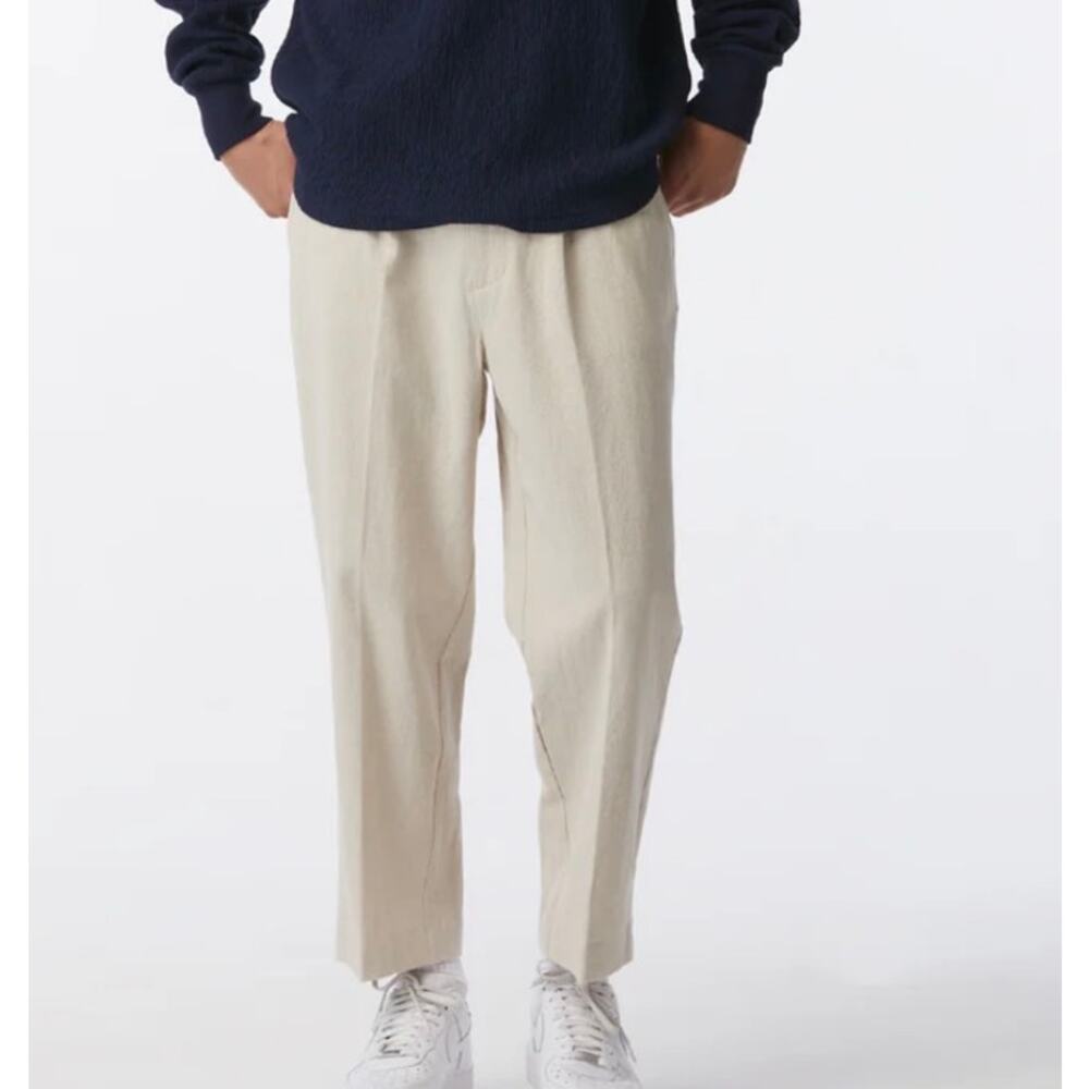 These are I Love Ugly Fitch Tailored Pants in a bone or beige color.